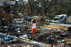 Photo: Jez Coulson/Insight/PanosKayla Watson 9 years old returns with her parents to find her home in Pascagoula on the Gulf Coast in Alabama entirely destroyed by the hurricane and its tidal surge. The families car is now in their pool.