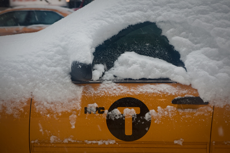 Taxi Under Snow : 8th Av and 50th : New York City