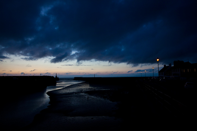 Harbour Entrance In The Last Slither of Light : Maryport : Cumbria UK