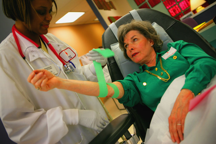 Give blood with a smile (almost) : Atlanta Red Cross